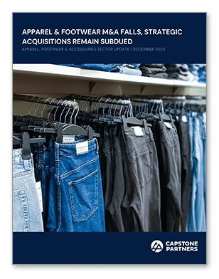 Cover of a report titled "Apparel & Footwear M&A Falls, Strategic Acquisitions Remain Subdued," featuring jeans and pants on a rack, reflecting the current slowdown in Apparel & Footwear M&A activity.